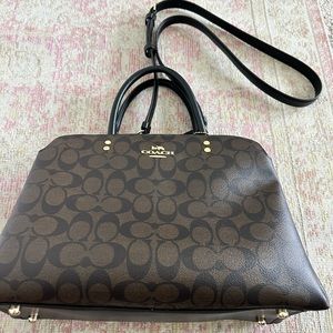 Black and Brown Coach handbag 🧋